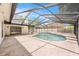 Screened-in pool area with a spacious deck, perfect for outdoor entertaining and relaxation at 3707 Orangepointe Rd, Valrico, FL 33596