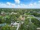 Aerial view of residential neighborhood, showing trees, green spaces and blue sky at 4101 Brooke Dr, Valrico, FL 33594