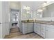 Spacious bathroom featuring dual sinks, granite countertops, and ample storage space at 4101 Brooke Dr, Valrico, FL 33594