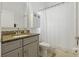 Bathroom with a shower and gray vanity at 4101 Brooke Dr, Valrico, FL 33594