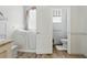 Bright bathroom featuring a walk-in tub and tiled floors at 4101 Brooke Dr, Valrico, FL 33594
