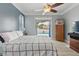 Bedroom features a view of a private pool and outdoor patio at 4101 Brooke Dr, Valrico, FL 33594