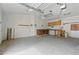 A functional detached garage includes workspace and ample storage solutions at 4101 Brooke Dr, Valrico, FL 33594