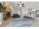 The living room has a brick fireplace and open concept kitchen with barstool seating at 4101 Brooke Dr, Valrico, FL 33594