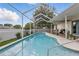 A delightful screened-in pool offers a perfect spot for summer fun and relaxation at 4101 Brooke Dr, Valrico, FL 33594