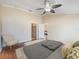 Comfortable main bedroom offering a walk-in closet, plush carpets, and an adjoining bathroom at 441 Thicket Crest Rd, Seffner, FL 33584