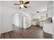 Bright kitchen featuring white cabinets, stainless steel appliances, and an adjacent dining area at 4935 42Nd N Pl, St Petersburg, FL 33709