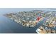 Extensive aerial view of the canal community displaying waterfront homes and serene waterway access at 5008 Southshore Dr, New Port Richey, FL 34652