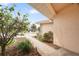 Inviting walkway to front entrance with decorative landscaping and charming curb appeal at 5008 Southshore Dr, New Port Richey, FL 34652