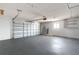 Spacious two car garage with window and room for storage or a workshop at 5008 Southshore Dr, New Port Richey, FL 34652