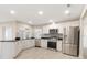 Modern kitchen with stainless steel appliances and granite countertops at 5008 Southshore Dr, New Port Richey, FL 34652