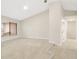Bright living room with tile flooring, neutral paint, and a large window at 5008 Southshore Dr, New Port Richey, FL 34652
