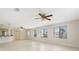 Bright living room with tile floors and lots of natural light at 5008 Southshore Dr, New Port Richey, FL 34652