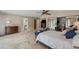 Large main bedroom with carpeting, ceiling fan and furnishings at 6514 Sunhigh Dr, New Port Richey, FL 34655
