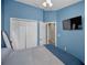 Vaulted bedroom with a closet and attached bathroom at 6902 47Th N Ln, Pinellas Park, FL 33781