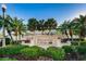 Welcome to Sawgrass Village, a community with beautiful landscaping and mature palm trees at 6902 47Th N Ln, Pinellas Park, FL 33781