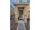 Inviting front entrance with potted plants and mulch landscaping at 6902 47Th N Ln, Pinellas Park, FL 33781