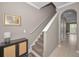 Hallway with staircase leading to the upper level and access to other rooms at 6902 47Th N Ln, Pinellas Park, FL 33781