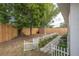 Enjoy a private backyard with a shed and professionally landscaped flower beds at 7108 N Howard Ave, Tampa, FL 33604