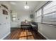 Charming dining area with built-in seating, natural light, and convenient entry to the exterior at 7108 N Howard Ave, Tampa, FL 33604