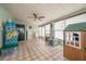 This bright sunroom is an amazing place to relax and play at 7108 N Howard Ave, Tampa, FL 33604