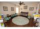 Bright Bedroom with crib, rug, toys, and plenty of natural light at 7120 Early Gold Ln, Riverview, FL 33578