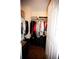 Neat closet with plenty of storage racks and organized bags and luggages at 7120 Early Gold Ln, Riverview, FL 33578