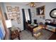 Functional home office with a large desk, filing cabinets, and decoratively framed photos on the wall at 7120 Early Gold Ln, Riverview, FL 33578