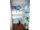 Storage room with shelving and wood floors at 7120 Early Gold Ln, Riverview, FL 33578