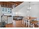 Bright dining area connecting to the living room and showcasing the wood-finished ceiling at 7337 Glasgow Rd, Weeki Wachee, FL 34613