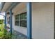 Lovely home showcasing brick detailing, large windows, and a well-kept yard with garden at 7337 Glasgow Rd, Weeki Wachee, FL 34613