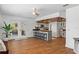 Open floor plan featuring a kitchen with an eat-in bar and French doors to the outside at 7337 Glasgow Rd, Weeki Wachee, FL 34613
