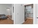 Modern kitchen with stainless steel refrigerator and views of the living area at 7337 Glasgow Rd, Weeki Wachee, FL 34613