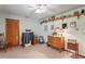 A comfortable bedroom with shelves, closet and charming antique furniture pieces at 7353 Dogwood Cres, Spring Hill, FL 34607