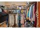 Walk-in closet with shelving and hanging racks at 7353 Dogwood Cres, Spring Hill, FL 34607