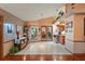 Open dining area features tile floors, stylish decor and bright natural light at 7353 Dogwood Cres, Spring Hill, FL 34607