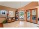 Dining area features tile floors and sliding doors with a view of the pool at 7353 Dogwood Cres, Spring Hill, FL 34607