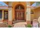 Close up of the home's impressive double-door front entrance, showcasing its architectural detail at 7353 Dogwood Cres, Spring Hill, FL 34607