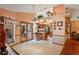 Inviting kitchen with a bar-top island and seamless access to the rest of the home at 7353 Dogwood Cres, Spring Hill, FL 34607