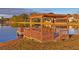 Waterfront deck on a pond, perfect for outdoor relaxation and enjoying the view at 7353 Dogwood Cres, Spring Hill, FL 34607