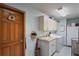 Laundry room is equipped with modern appliances, ample storage, and stylish decor, offering functionality and style at 7353 Dogwood Cres, Spring Hill, FL 34607
