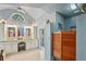 Bright bathroom with double vanity, makeup area, and walk-in shower at 7353 Dogwood Cres, Spring Hill, FL 34607