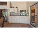 Outdoor kitchen with countertop, cabinets, and sink, perfect for outdoor entertaining at 7353 Dogwood Cres, Spring Hill, FL 34607
