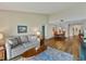Open concept living room and dining room with lots of space to entertain at 7500 Sunshine Skyway S Ln # 201, St Petersburg, FL 33711