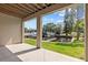 Back porch overlooking a dock and boat slips with a canal view at 800 Callista Cay Loop, Tarpon Springs, FL 34689