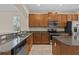A great kitchen with stainless steel appliances, granite countertops and ample cabinet space at 800 Callista Cay Loop, Tarpon Springs, FL 34689