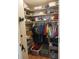 Walk-in closet with shelving and hanging rods, providing ample storage space at 8313 Cavalry Dr, Hudson, FL 34667