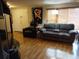 Comfortable living room with modern decor and a large window allowing for plenty of natural light at 8313 Cavalry Dr, Hudson, FL 34667