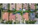 Aerial view of the property with private pool, landscaped backyard, and well-maintained surroundings at 8434 Dunham Station Dr, Tampa, FL 33647