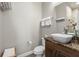 Modern bathroom with a vessel sink, granite countertop, and neutral wall color at 8434 Dunham Station Dr, Tampa, FL 33647
